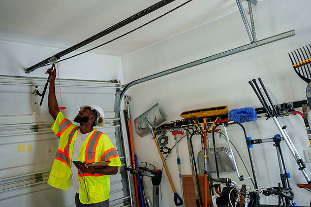 Professional Garage Door Panel Replacement technician working in Chickasaw County County, MS